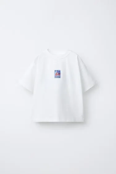 Футболка с нашивкой «мото»- Заказать в России