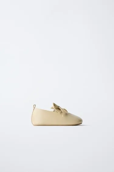 Балетки с бантом