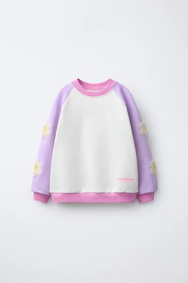 Толстовка с цветочным принтом и контрастными рукавами- Заказать в России