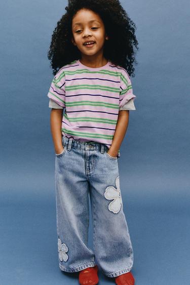 Джинсы  с цветочными патчами- Заказать в России