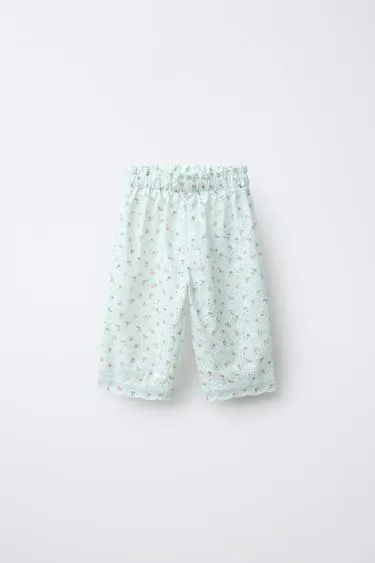 Брюки-кюлоты с вышивкой в швейцарском стиле и цветочным принтом- Заказать в России