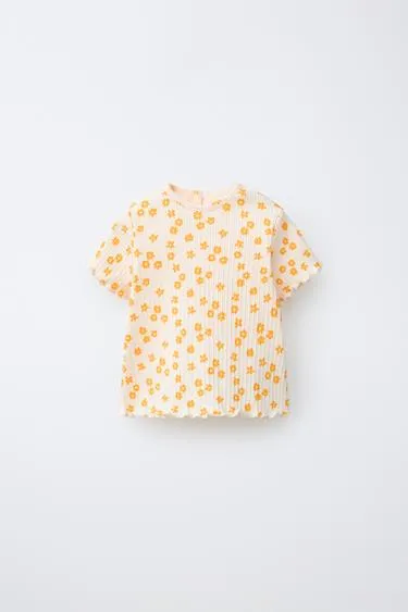 Футболка в рубчик с цветочным принтом- Заказать в России