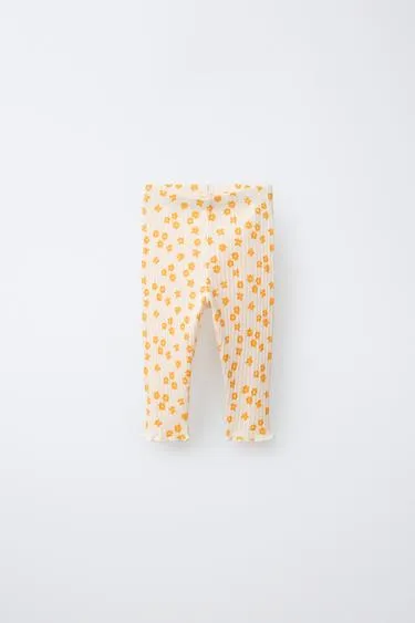 Легинсы в рубчик с цветочным принтом- Заказать в России