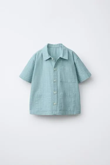 Рубашка в клетку с карманами