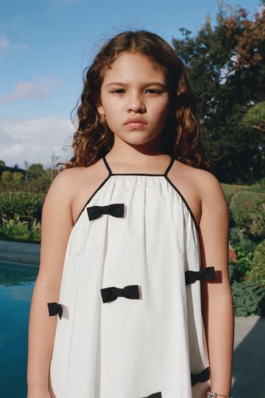 Платье с горловиной халтер и бантом- Заказать в России