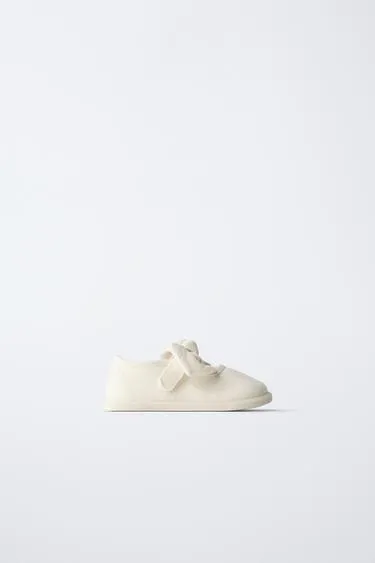 Кеды без каблука с бантом