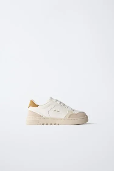 Кроссовки с контрастными деталями- Заказать в России