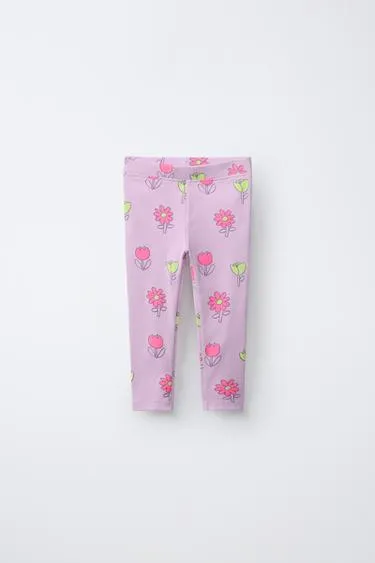 Легинсы в рубчик с принтом