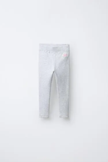 Леггинсы в рубчик с этикеткой