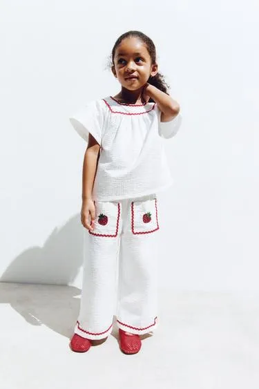 Брюки-кюлоты из рельефной ткани с контрастными волнистыми краями