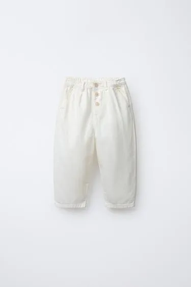 Брюки с пуговицами