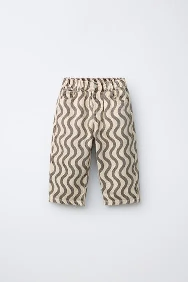 Джинсы с геометрическим принтом- Заказать в России