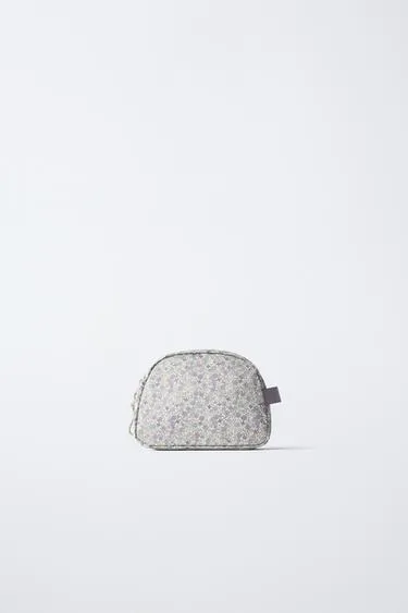 Дорожная косметичка с цветочным принтом- Заказать в России