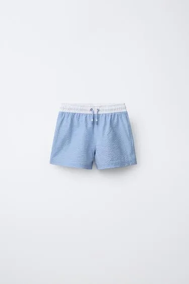 6-14 лет/плавки-бермуды с нашивкой- Заказать в России