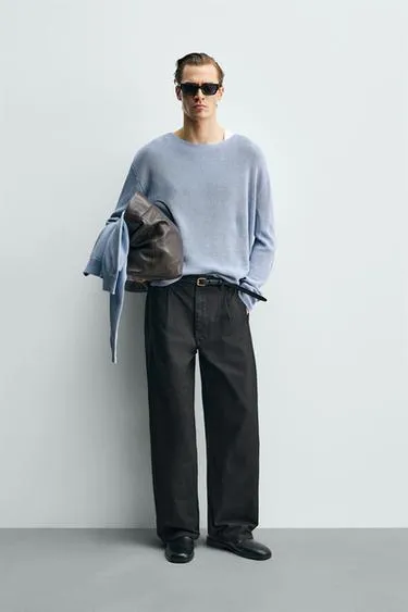 Брюки свободного кроя со складками- Заказать в России