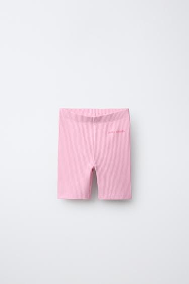 Велосипедные легинсы в рубчик с рельефной надписью