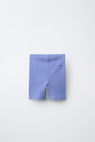 Легинсы-велосипедки в рубчик с рельефной надписью