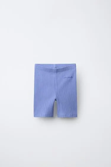 Легинсы-велосипедки в рубчик с рельефной надписью- Заказать в России