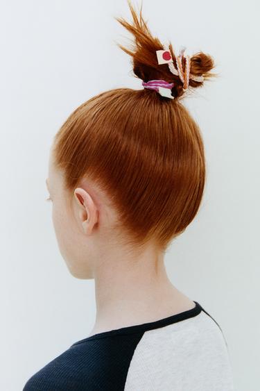 Набор из пяти резинок для волос с этикеткой