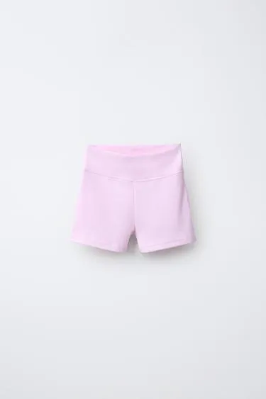 Короткие легинсы в рубчик