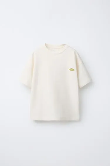 Футболка из ткани оттоман с нашивкой