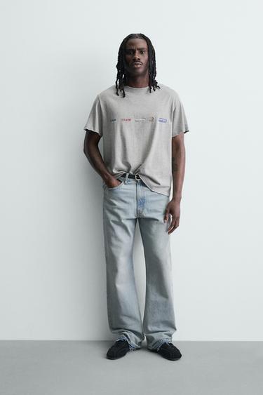 Zara Футболка из ткани с эффектом потертости и принтом купить с доставкой.