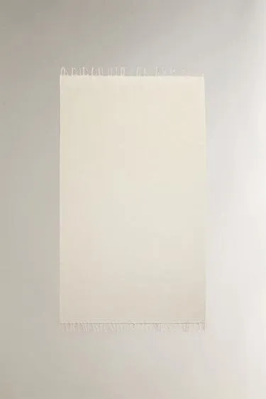 Хлопковое пляжное полотенце с бахромой