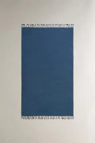 Пляжное полотенце из хлопка с бахромой