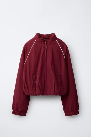 Спортивная куртка с контрастными деталями- Заказать в России