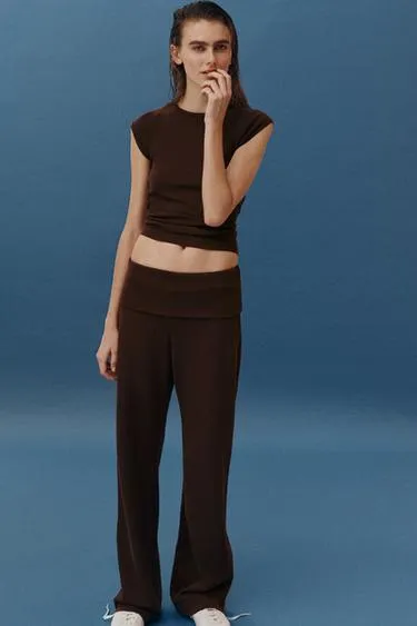 Брюки из ткани интерлок с эффектом потертости