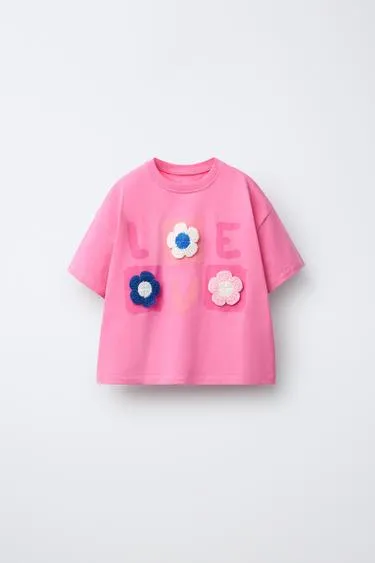 Футболка с вязаными цветами- Заказать в России