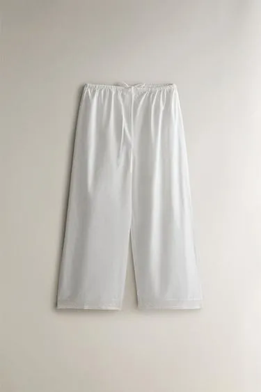 Хлопковые брюки с кружевными оборками- Заказать в России