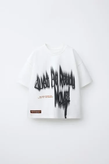 Футболка с граффити-принтом- Заказать в России