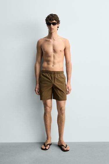 Длинные плавки в полоску с эффектом потертости- Заказать в России