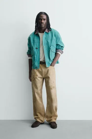 Брюки прямого кроя с эффектом потертости- Заказать в России