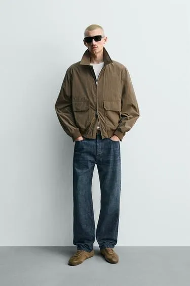 Куртка из высокотехнологичной ткани классического кроя- Заказать в России