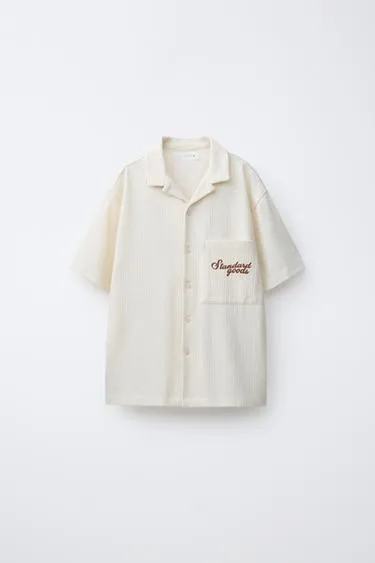 Рубашка из рельефной ткани с надписью- Заказать в России