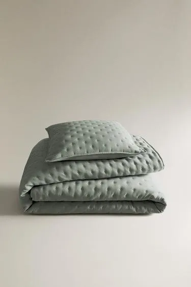 Стежковое одеяло с точками