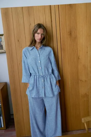 Брюки с широкими штанинами и защипами из смесового льна