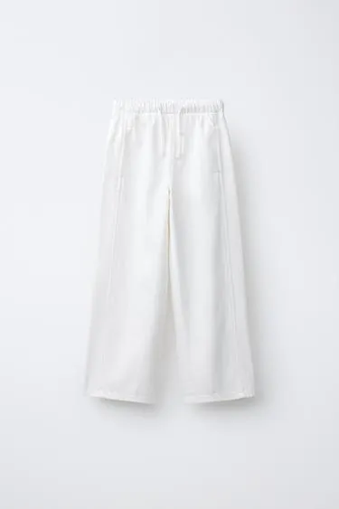 Джинсы широкие с завязками- Заказать в России