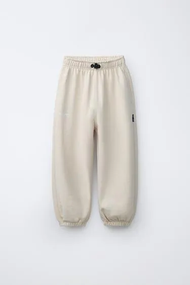 Флисовые брюки Balloon с текстом- Заказать в России