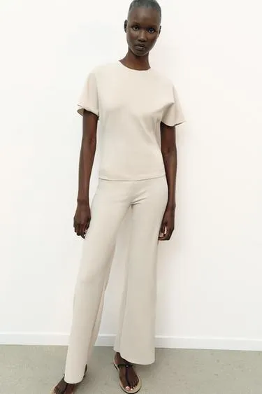 Широкие эластичные брюки- Заказать в России