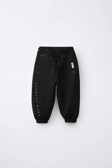 Брюки-джоггеры из ткани интерлок- Заказать в России