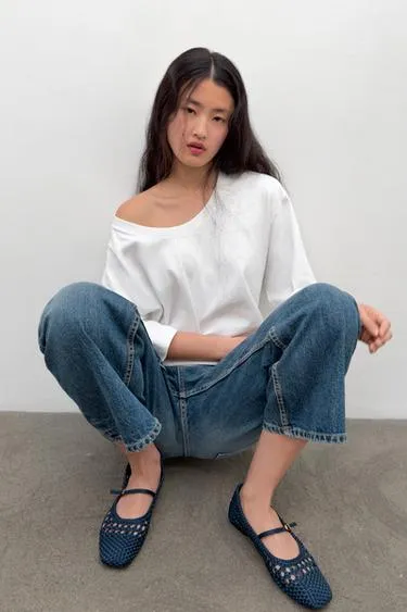 Плетеные балетки с пряжкой