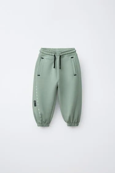 Брюки-джоггеры из ткани интерлок- Заказать в России