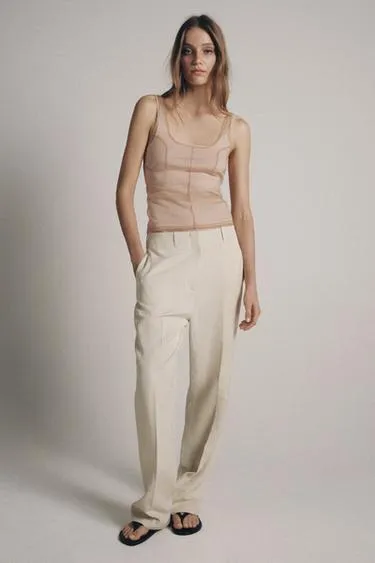 Топ из полупрозрачной ткани с декоративной строчкой- Заказать в России