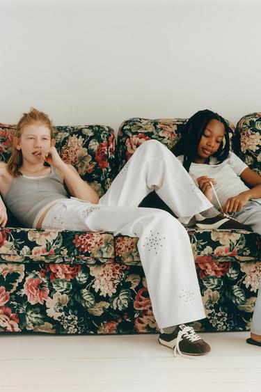 Джинсы Wide Leg с заклепками- Заказать в России