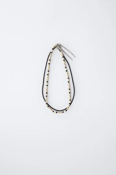 Набор из двух оплетенных веревкой и деревянных бусин ожерелий- Заказать в России