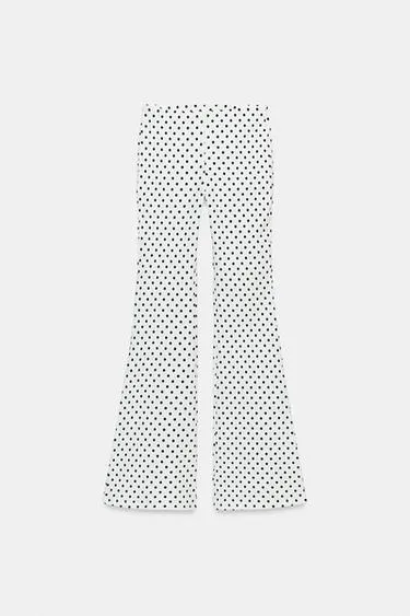 Расклешенные брюки стретч в горошек