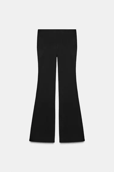 Расклешенные брюки стрейч в горошек